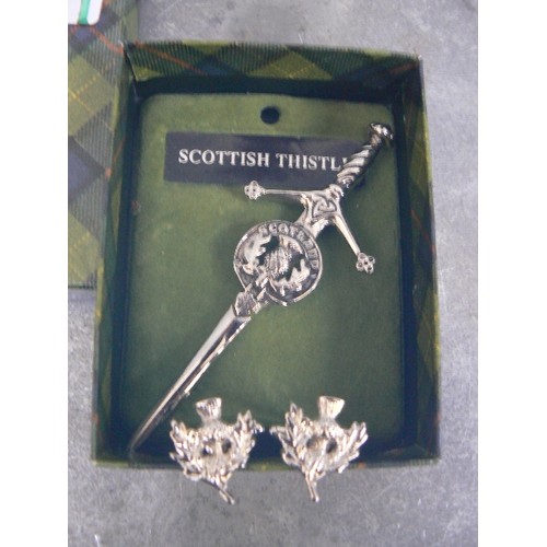 104 - A SCOTTISH THISTLE KILT BROOCH WITH MATCHING CUFFLINKS