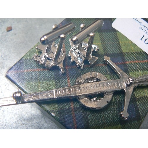 104 - A SCOTTISH THISTLE KILT BROOCH WITH MATCHING CUFFLINKS