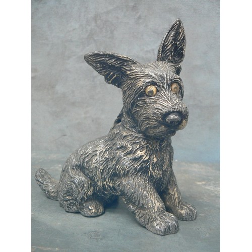 75A - A CIRCA 1920'A SPELTER SCOTTIE DOG TABLE LIGHTER WITH GLASS EYES - 17CM H