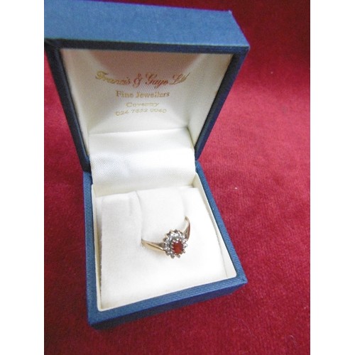 40 - A BEAUTIFUL 9ct GOLD ENGAGEMENT RING WITH RUBY RED AND WHITE STONES SURROUNDING (Cubic zirconia) WEI... 