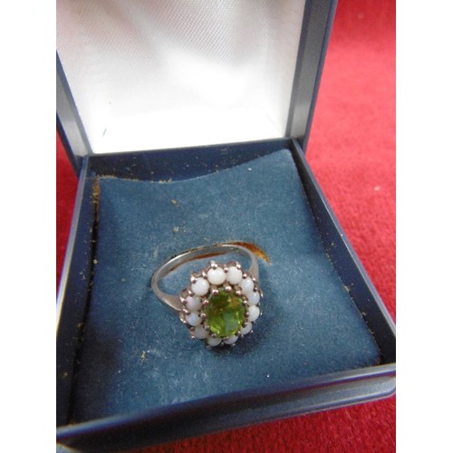 63 - A RING OF PERIDOT AND 12 FIRE OPALS ALL SET IN SILVER THE OPALS ARE VERY BRIGHT WITH  IRIDESCENT RED... 