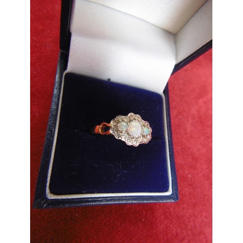 29 - 14ct GOLD CLUSTER RING OF 3 FIRE OPALS AND  16 DIAMONDS HIGHLY COLOURED FIRE OPALS AND THE BRIGHT CU... 