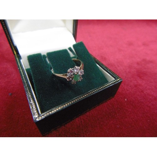 41 - AN ENCHANTING 9ct GOLD CLUSTER ENGAGEMENT RING WITH LIGHT GREEN GARNET CENTRE STONE SURROUNDED BY WH... 