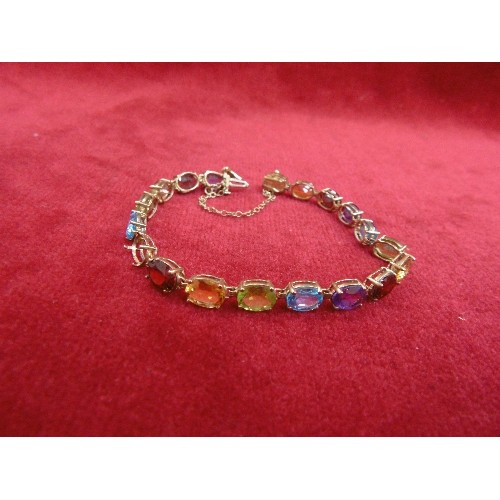 47 - 10ct BRACELET WITH MULTI COULOURED STONES WEIGHT 10.87g (one stone missing)