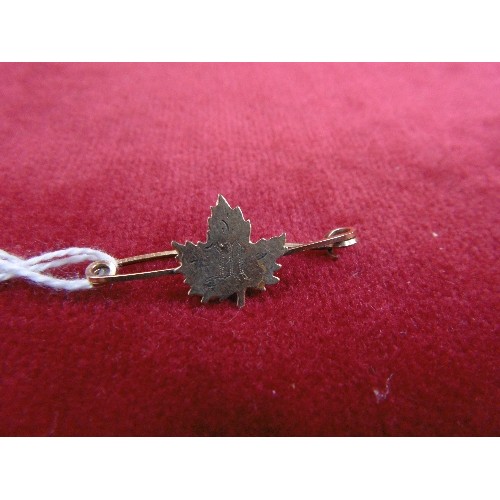 61 - A HOME MADE CANADIAN 9ct GOLD MAPLE LEAF BROOCH ENGRAVED WITH AN 