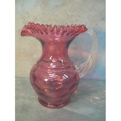 199 - LARGE VICTORIAN STYLE CRANBERRY GLASS JUG WITH RUFFLED EDGE - 25CM H