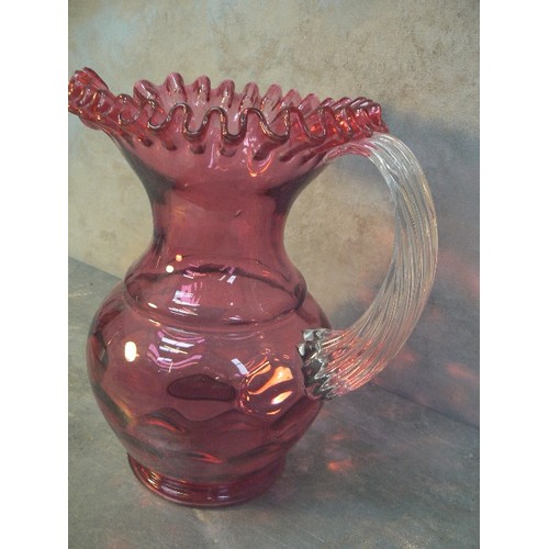 199 - LARGE VICTORIAN STYLE CRANBERRY GLASS JUG WITH RUFFLED EDGE - 25CM H