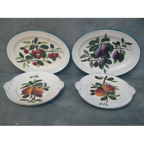 216 - FOUR EARLY 20TH CENTURY VILLEROY & BOCH PLATES HAND PAINTED WITH FRUITS. ONE OF THE MEAT PLATES IS C... 