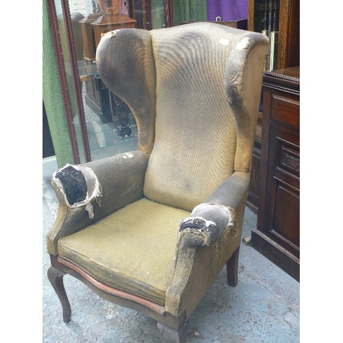 376 - AN ANTIQUE WING ARMCHAIR WITH HIGH BACK AND PRONOUNCED WINGS IN THE 18TH CENTURY STYLE. SOLID MAHOGA... 