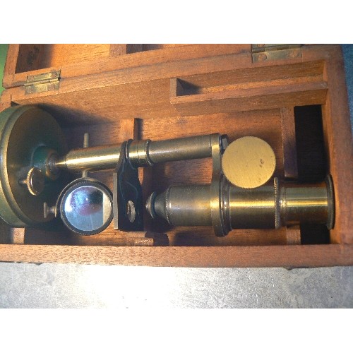 136 - LATE VICTORIAN OR EDWARDIAN STUDENTS MICROSCOPE IN ORIGINAL FITTED MAHOGANY BOX - THE COLUMN TILTS O... 