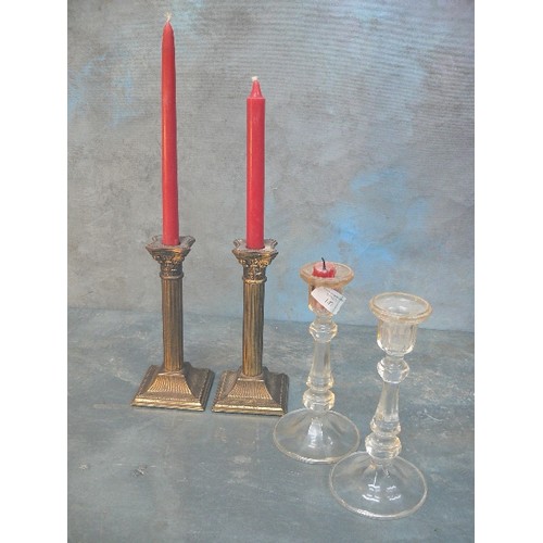 147 - PAIR OF VINTAGE CORINTHIAN COLUMN BRASS CANDLESTICKS - 20CM. ALSO A PAIR OF GLASS CANDLESTICKS 20CM