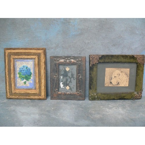 132 - THREE ANTIQUE FRAMES INCLUDING AN EMBOSSED COPPER ART NOUVEAU FRAME, AN EDWARDIAN FABRIC FRAME CONTA... 