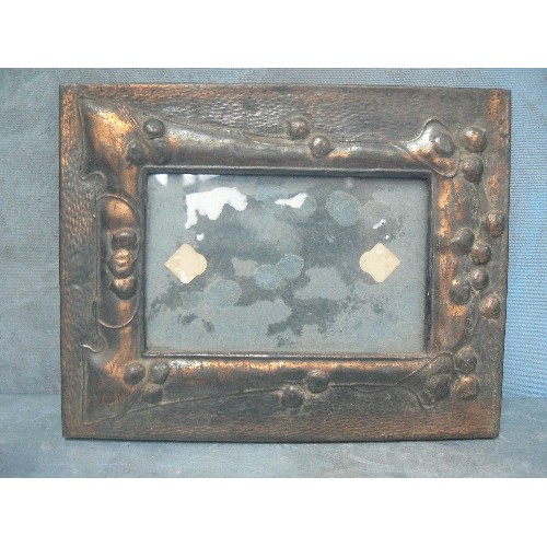 132 - THREE ANTIQUE FRAMES INCLUDING AN EMBOSSED COPPER ART NOUVEAU FRAME, AN EDWARDIAN FABRIC FRAME CONTA... 