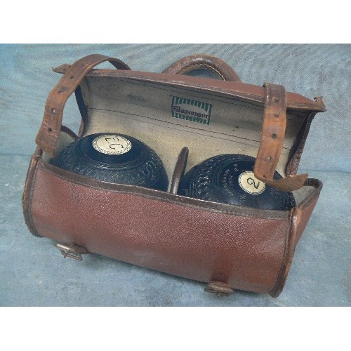 209 - PAIR OF VINTAGE JAQUES ANS SONS LAWN BOWLS IN AN OLD LEATHERETTE BAG