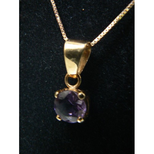 110 - A PENDANT OF 18ct GOLD & AMETHYST, WEIGHT 2.09g THE CHAIN IS 9ct GOLD AND 16 INCHES LONG  CHAIN 1.79... 