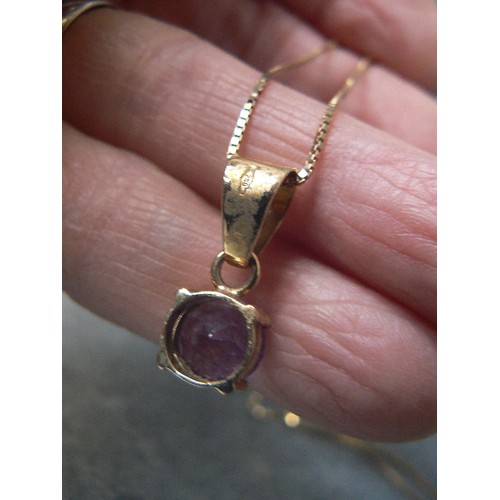 110 - A PENDANT OF 18ct GOLD & AMETHYST, WEIGHT 2.09g THE CHAIN IS 9ct GOLD AND 16 INCHES LONG  CHAIN 1.79... 