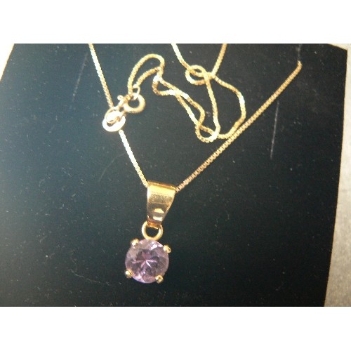 110 - A PENDANT OF 18ct GOLD & AMETHYST, WEIGHT 2.09g THE CHAIN IS 9ct GOLD AND 16 INCHES LONG  CHAIN 1.79... 