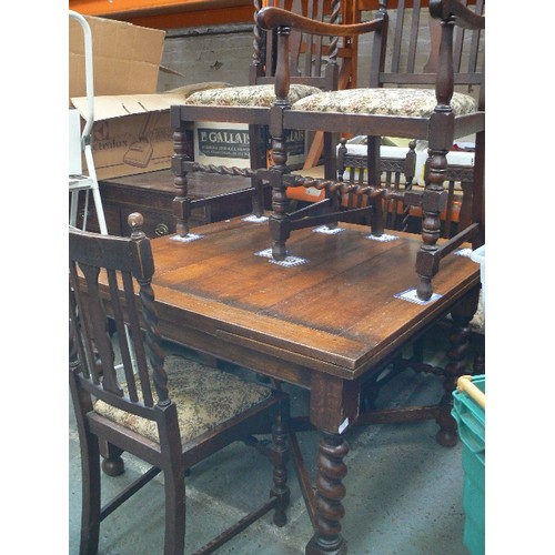 388 - 1920'S OAK DRAW LEAF DINING TABLE WITH BARLEY TWIST LEGS AND CROSS STRETCHERS, WITH FIVE MATCHING DI... 