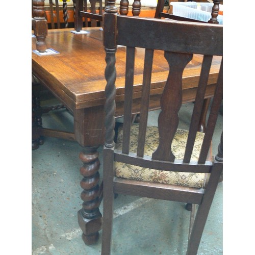 388 - 1920'S OAK DRAW LEAF DINING TABLE WITH BARLEY TWIST LEGS AND CROSS STRETCHERS, WITH FIVE MATCHING DI... 