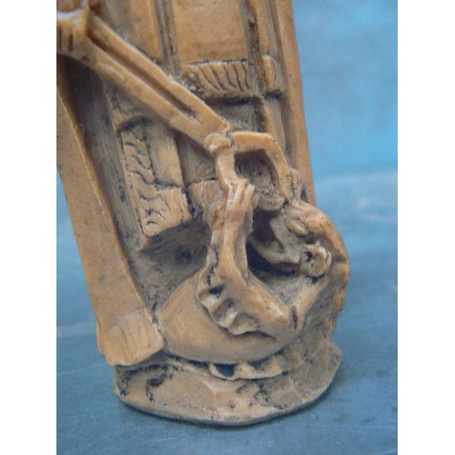 232 - AN UNUSUAL RESIN FIGURE OF A BISHOP WITH A DRAGON AT HIS FEET - 18CM