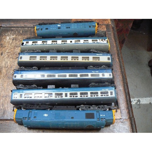 519 - 2 OO HORNBY DIESEL LOCOMOTIVES + CARRIAGES, 1 CARRIAGE WITH DAMAGE