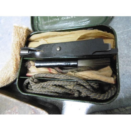 438 - A POST WAR EX BRITISH ARMY GUN CLEANING KIT WITH COMBI TOOL, OIL BOTTLE, FLICKER BRUSH, PULL THROUGH... 