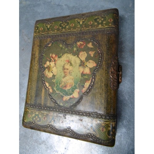 134A - A VICTORIAN PHOTOGRAPH ALBUM, THE COVER WITH UNUSUAL DECOUPAGE TYPE DECORATION AND WITH EMBOSSED VEL... 