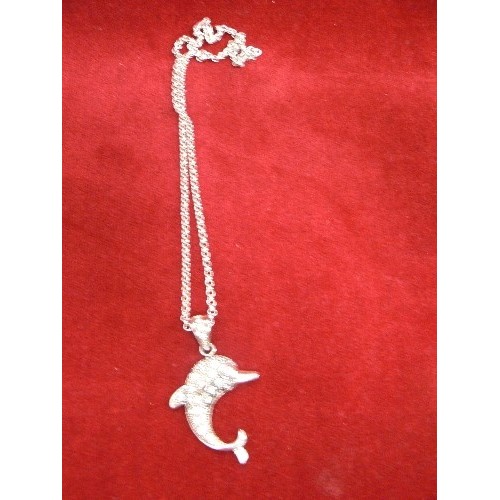 115 - A HEAVY SOLID SILVER DOLPHIN PENDANT ADORNED WITH WHITE STONES ON A SILVER 20