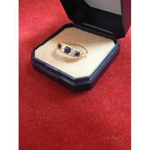 66 - AN 18ct GOLD RING WITH 3 SAPPHIRES AND ROUND CUT DIAMONDS WEIGHT 4.18 SIZE O