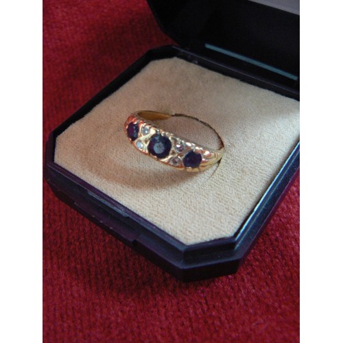 66 - AN 18ct GOLD RING WITH 3 SAPPHIRES AND ROUND CUT DIAMONDS WEIGHT 4.18 SIZE O