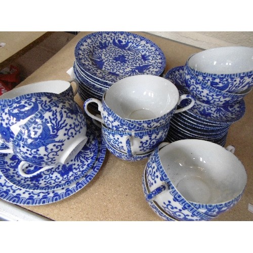 200B - A FINE JAPANESE EGGSHELL PORCELAIN TEASET IN BLUE AND WHITE PHOENIX DESIGN - 39 PIECES - CIRCA 1920