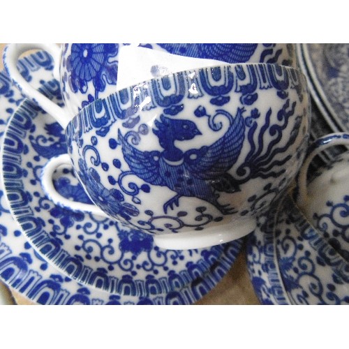 200B - A FINE JAPANESE EGGSHELL PORCELAIN TEASET IN BLUE AND WHITE PHOENIX DESIGN - 39 PIECES - CIRCA 1920