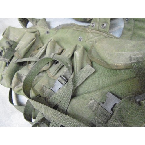 460 - A USSR MILITARY HELMET TOGETHER WITH A GREEN CANVAS AMMO POUCH AND A SMALL MILITARY BAG