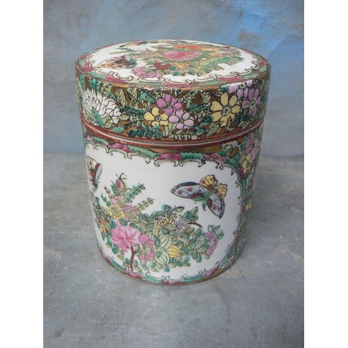 203C - 20TH CENTURY CHINESE PORCELAIN JAR WITH LID IN FAMILLE ROSE COLOURS WITH PANELS OF FLOWERS AND BUTTE... 