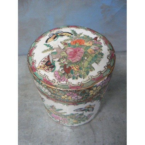 203C - 20TH CENTURY CHINESE PORCELAIN JAR WITH LID IN FAMILLE ROSE COLOURS WITH PANELS OF FLOWERS AND BUTTE... 