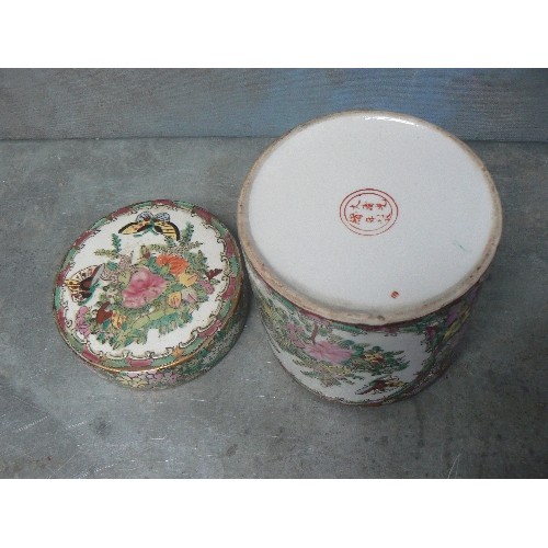 203C - 20TH CENTURY CHINESE PORCELAIN JAR WITH LID IN FAMILLE ROSE COLOURS WITH PANELS OF FLOWERS AND BUTTE... 