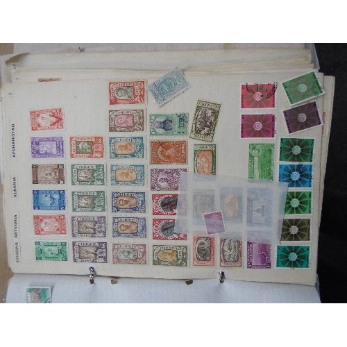 242 - TWO COMPREHENSIVE STAMP ALBUMS WITH THOUSANDS OF STAMPS. THE FIRST A (AJMAN) TO D (DOMINICAN REPUBLI... 