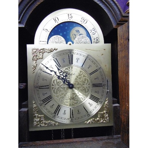 353 - A 20TH CENTURY OAK CASED LONGCASE OR GRANDFATHER CLOCK, THE BRASS FACE MARKED 