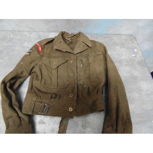 461 - A POST WW2 BATTLEDRESS JACKET WITH ROYAL WARWICKSHIRE REGIMENT SHOULDER BADGE - LABEL READS 