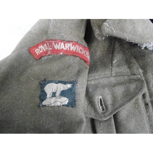 461 - A POST WW2 BATTLEDRESS JACKET WITH ROYAL WARWICKSHIRE REGIMENT SHOULDER BADGE - LABEL READS 