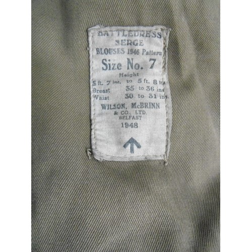 461 - A POST WW2 BATTLEDRESS JACKET WITH ROYAL WARWICKSHIRE REGIMENT SHOULDER BADGE - LABEL READS 