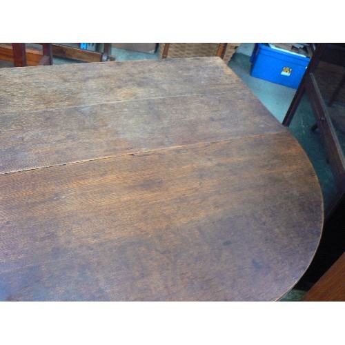 397 - GEORGIAN OAK DROP LEAF DINING TABLE, OVAL SHAPE. WITH LATER CASTORS ADDED