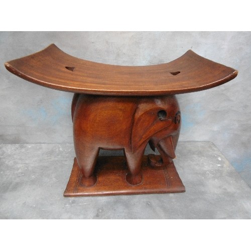 223B - EARLY 20TH CENTURY AFRICAN ASHANTI ELEPHANT STOOL. IN SOLID HARDWOOD. DAMAGE TO END OF ONE TUSK, SEE... 