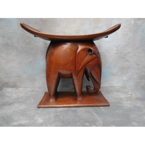 223B - EARLY 20TH CENTURY AFRICAN ASHANTI ELEPHANT STOOL. IN SOLID HARDWOOD. DAMAGE TO END OF ONE TUSK, SEE... 