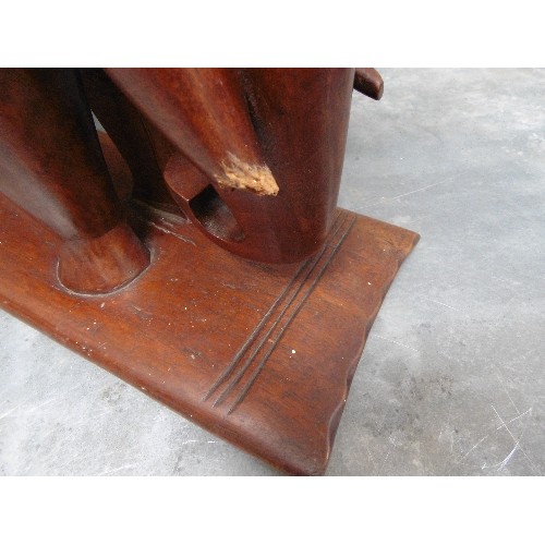 223B - EARLY 20TH CENTURY AFRICAN ASHANTI ELEPHANT STOOL. IN SOLID HARDWOOD. DAMAGE TO END OF ONE TUSK, SEE... 