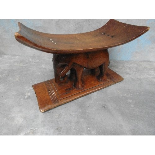 223D - A GOOD EARLY 20TH CENTURY ASHANTI ELEPHANT STOOL OF SMALL PROPORTIONS, CARVED IN SOLID AFRICAN HARDW... 