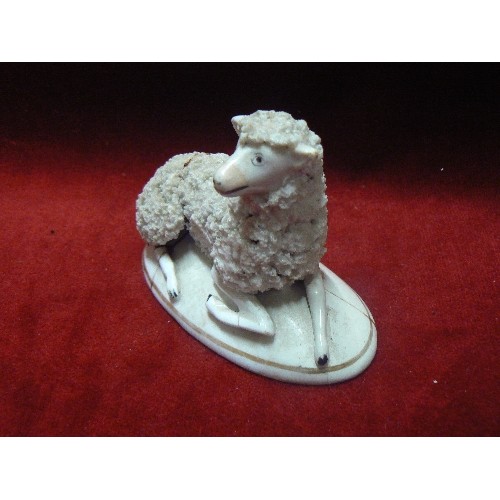 6 - AN EARLY 19TH CENTURY STAFFORDSHIRE POODLE (99CM H) AND A SHEEP (8CM H). ALSO A 1960'S PORCELAIN POO... 