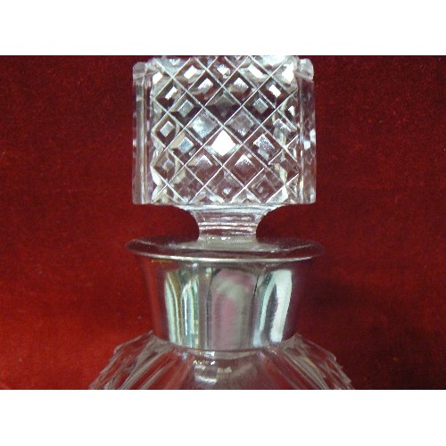 74 - A VERY GOOD QUALITY HEAVY CRYSTAL SPIRIT DECANTER WITH SQUARE SHAPED STOPPER AND SILVER PLATED NECK