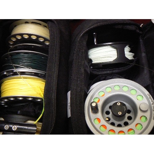 129 - FISHING LINE REELS. GREYS, DRAGONFLY LARGE ARBOR ETC. IN 2 GREYS BAGS.