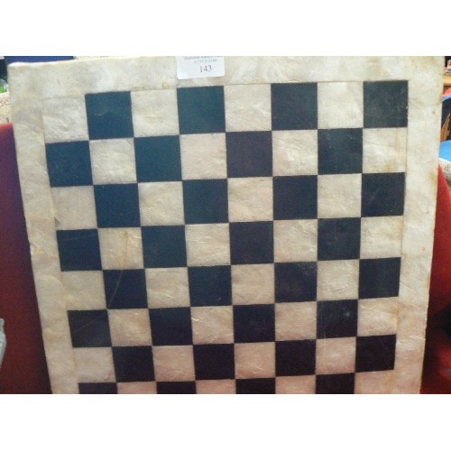 143 - MOTHER OF PEARL OR MARBLE DRAUGHT/CHESS BOARD, AND A CRAFTSMAN, JERSEY-MADE BOARD WITH EMBOSSED LEAT... 